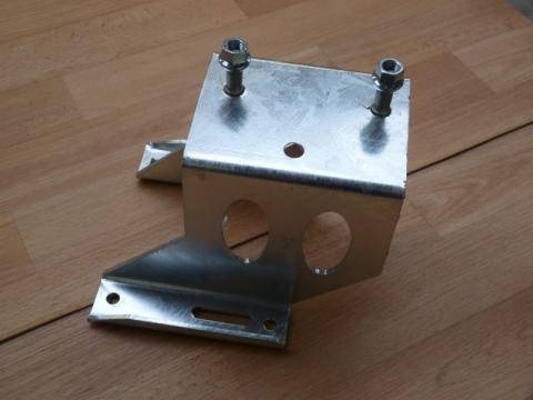 Spare wheel carrier for mounting on side panel incl. mounting material